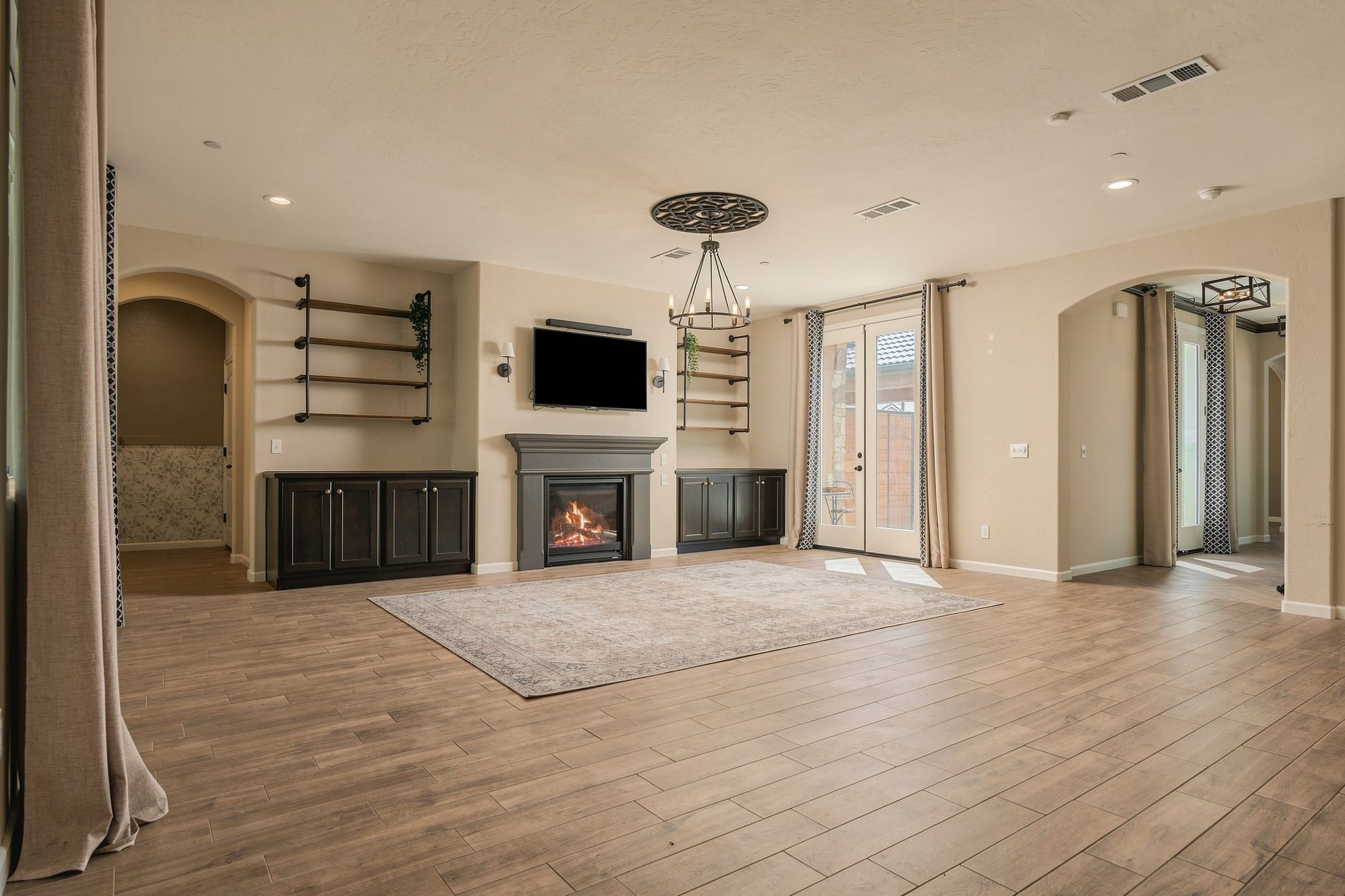 Living room with fireplace at dusk