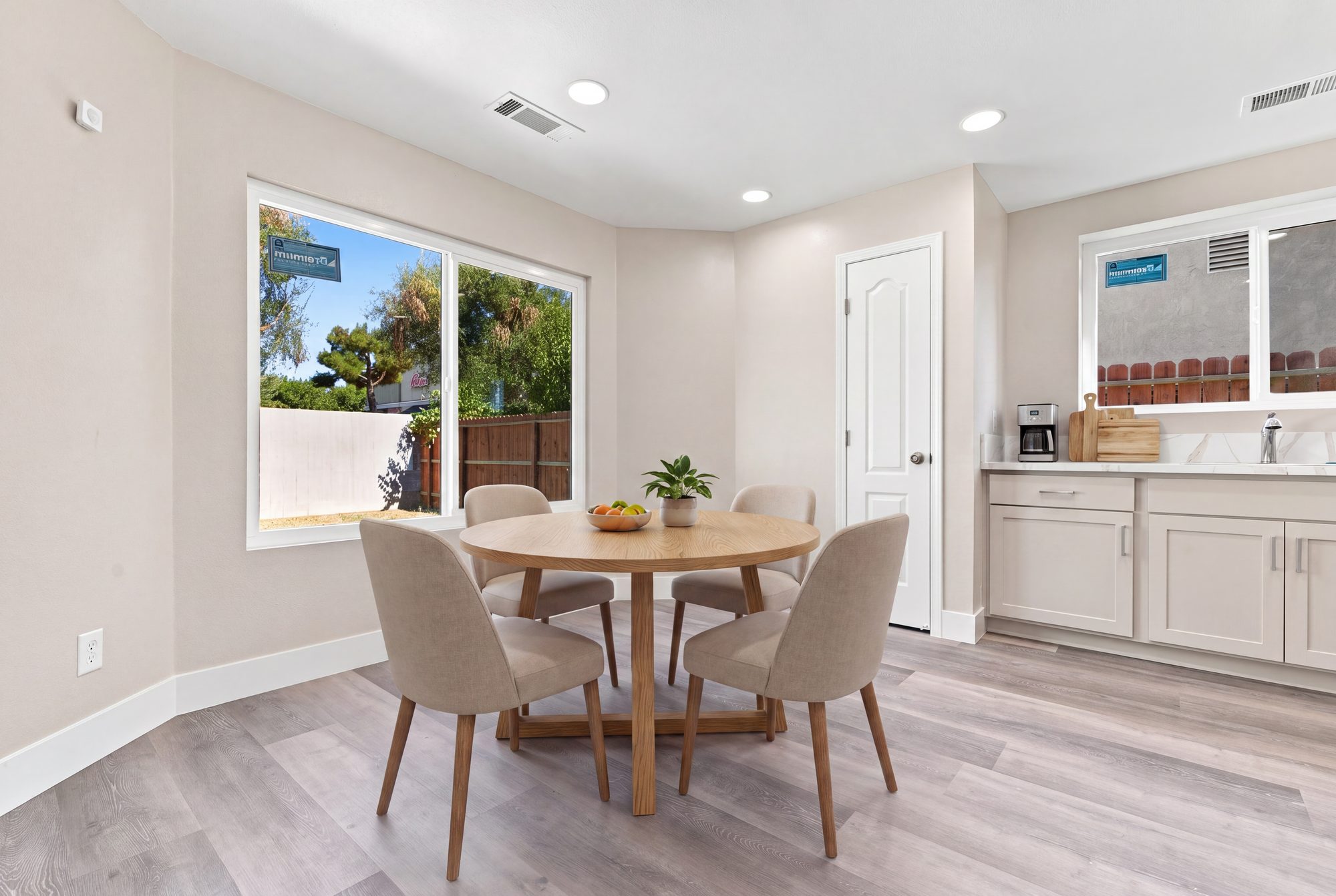 Staged dining nook with natural light — Farmersville real estate photography, California