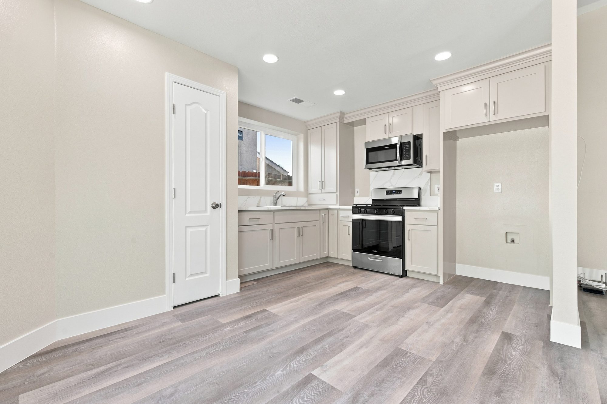 Renovated white kitchen — Farmersville real estate photography, California