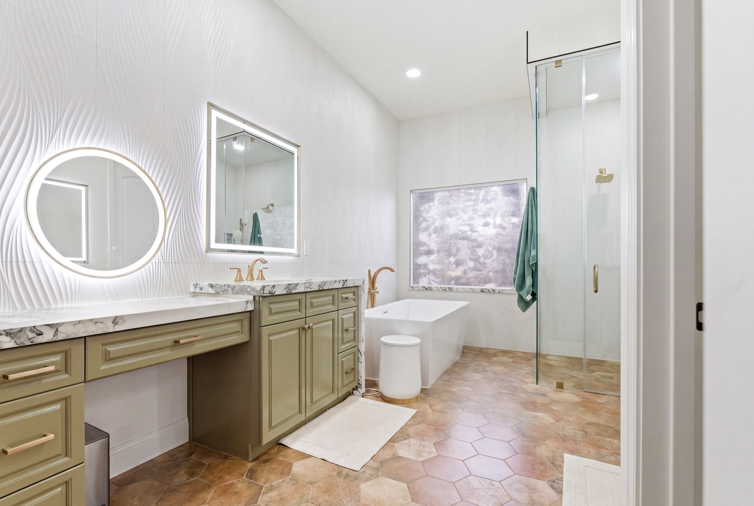 Real estate photography of a spa-style primary bathroom in Visalia, California