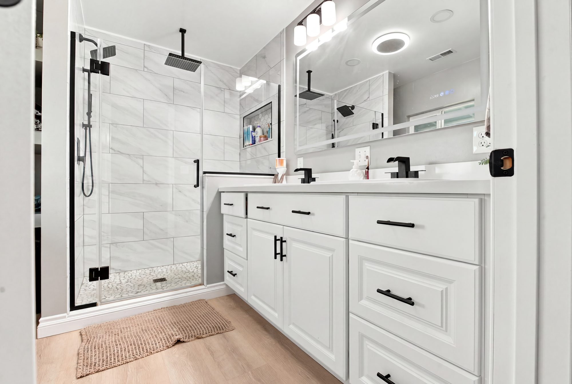 Spa bathroom with marble walk-in shower and double vanity — Lindsay real estate photography, California