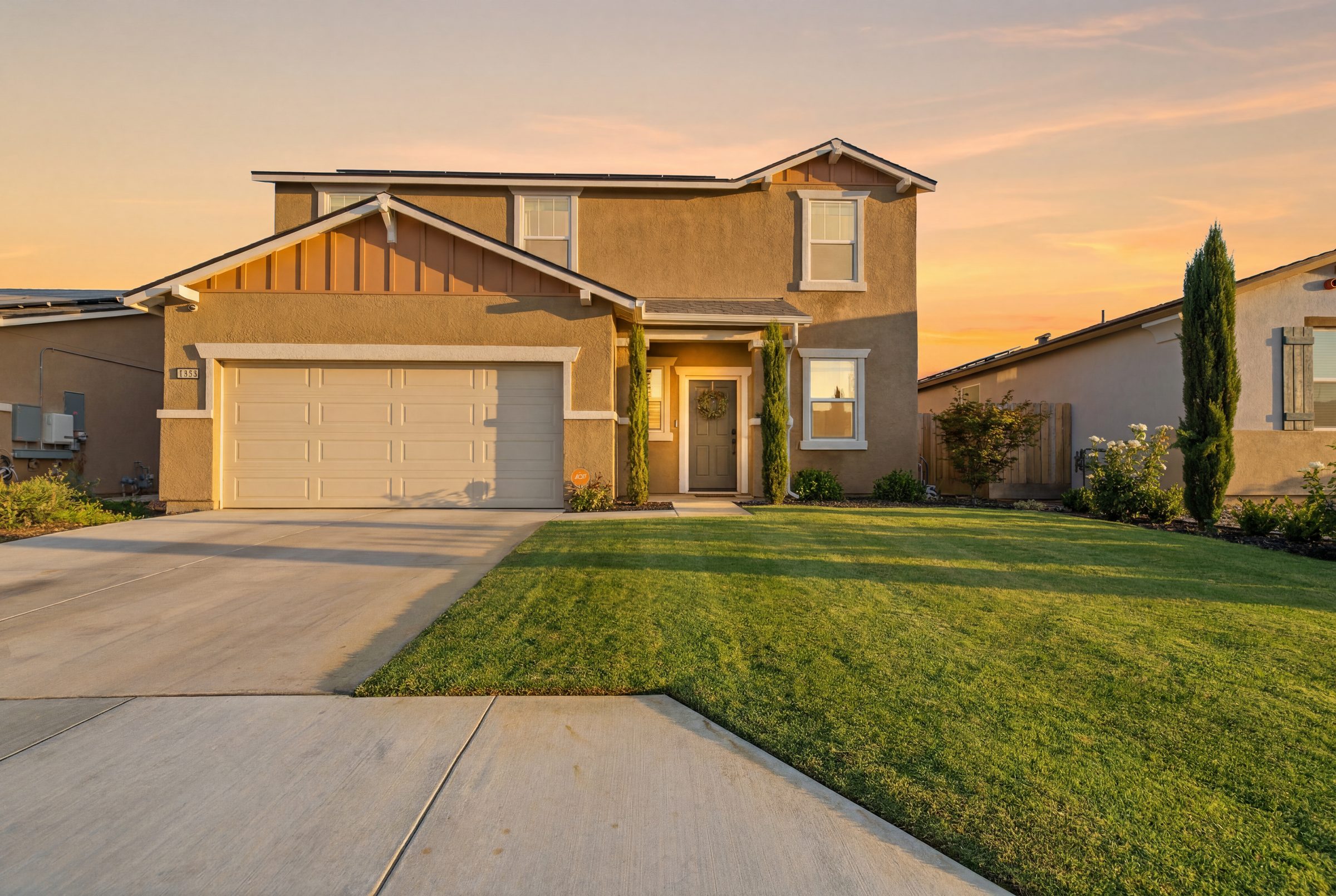 Twilight exterior of a Tulare home at sunset — real estate photography, California